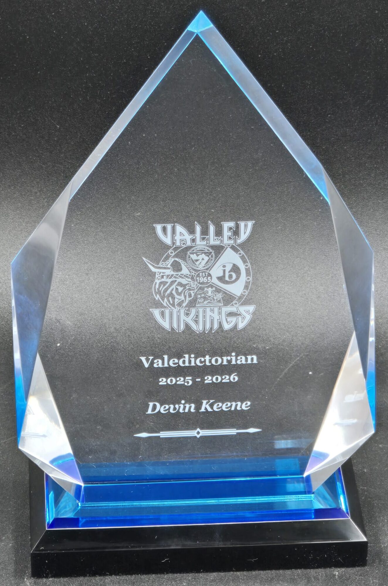 Clear crystal diamond award with blue base and laser-engraved school mascot logo for valedictorian recognition