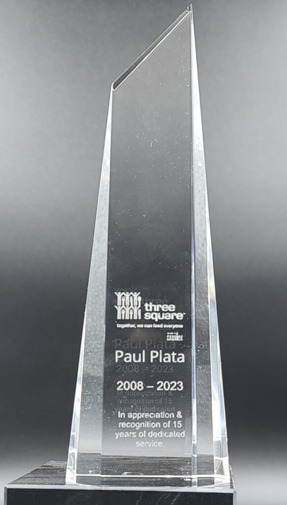 Custom crystal obelisk award engraved for Paul Plata, Three Square 15 years of dedicated service recognition, Las Vegas