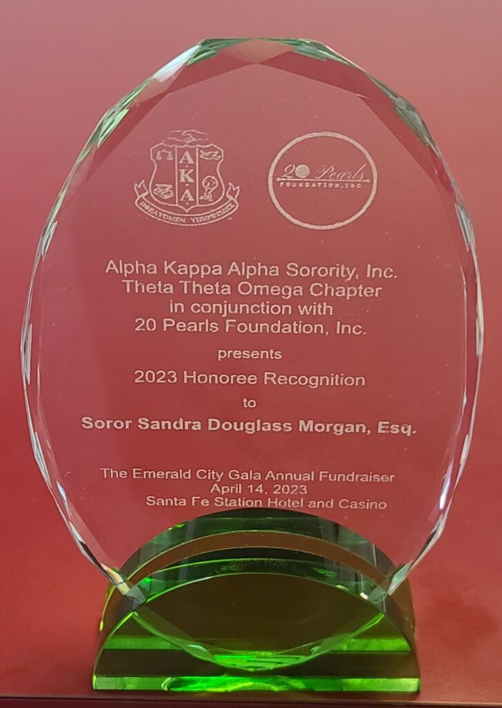 Custom oval green crystal plaque engraved for Alpha Kappa Alpha sorority recognition award, Las Vegas trophy shop